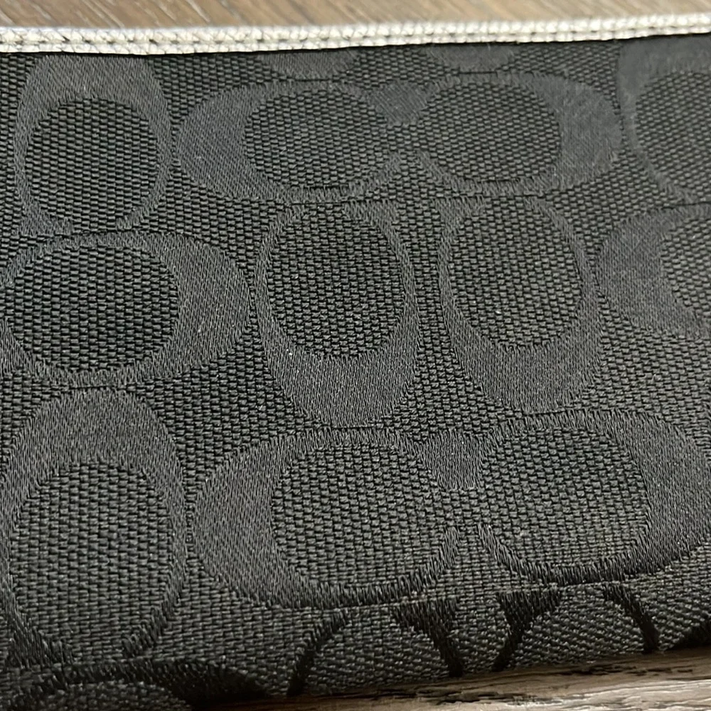Coach black signature silver metallic leather edge wristlet